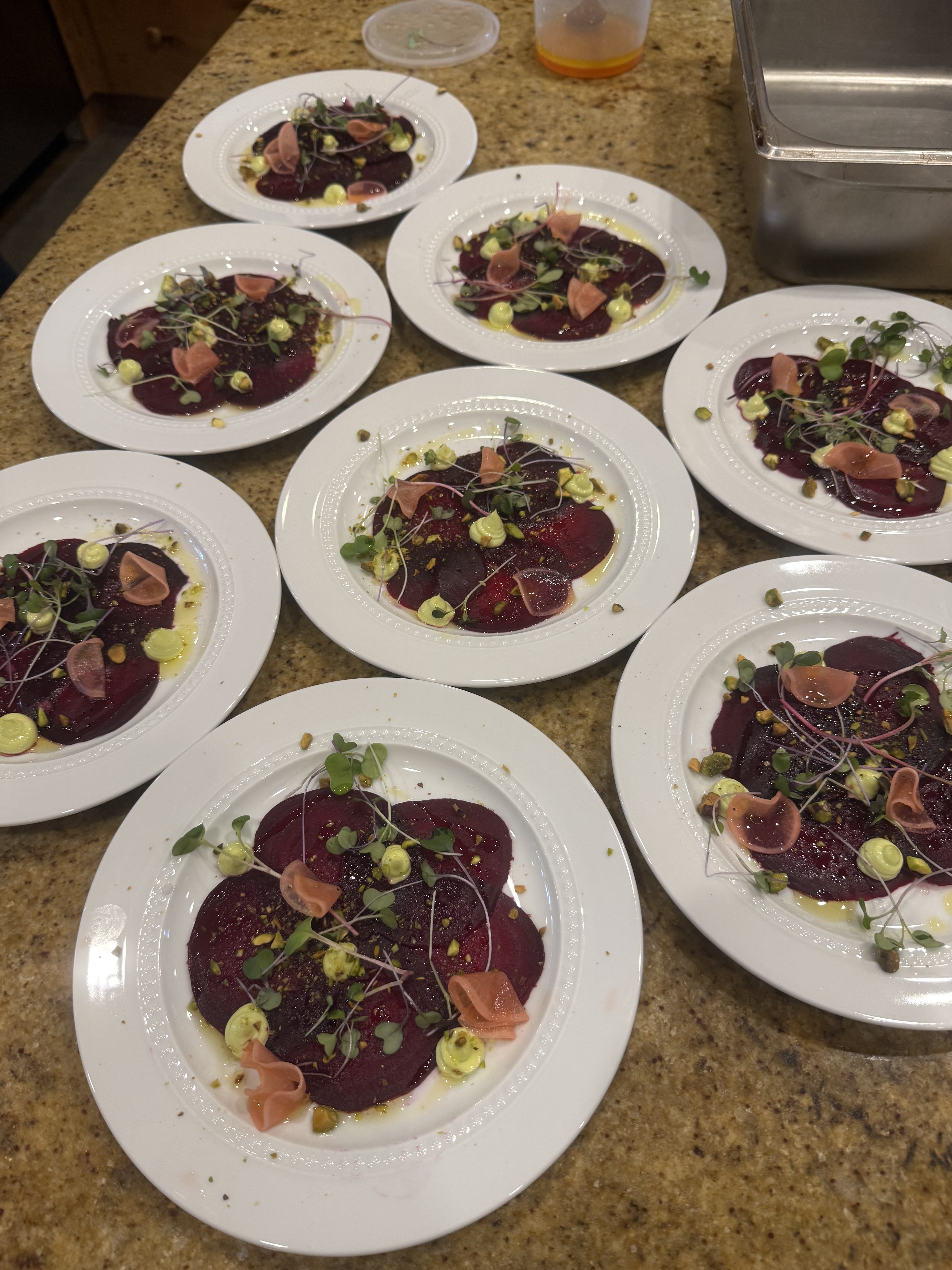 Beet salad with microgreens plated for dinner service